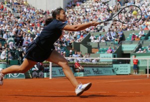 France's Marion Bartoli hits a return to