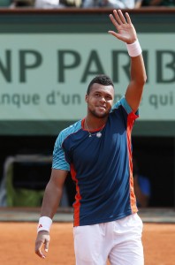 France's Jo-Wilfried Tsonga reacts after