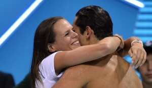 France's Laure Manaudou congratulates her brother Florent Manaudou after he won the men's 50m freestyle final during the London 2012 Olympic Games at the Aquatics Centre